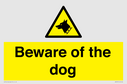 beware-of-the-dog-with-dog-warning-symbol~